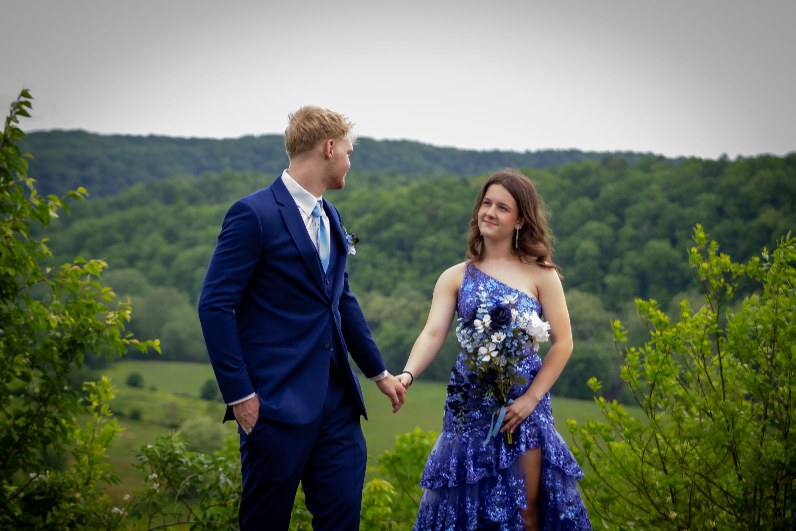 Xavier and his girlfriend taking pictures for prom.